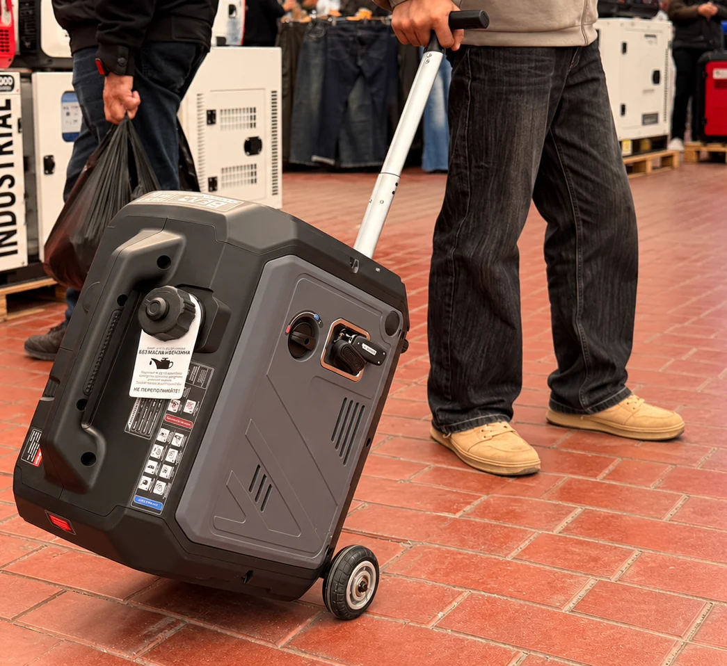 H-C-5500-B pulled on its two wheels by the telescopic handle across a store floor